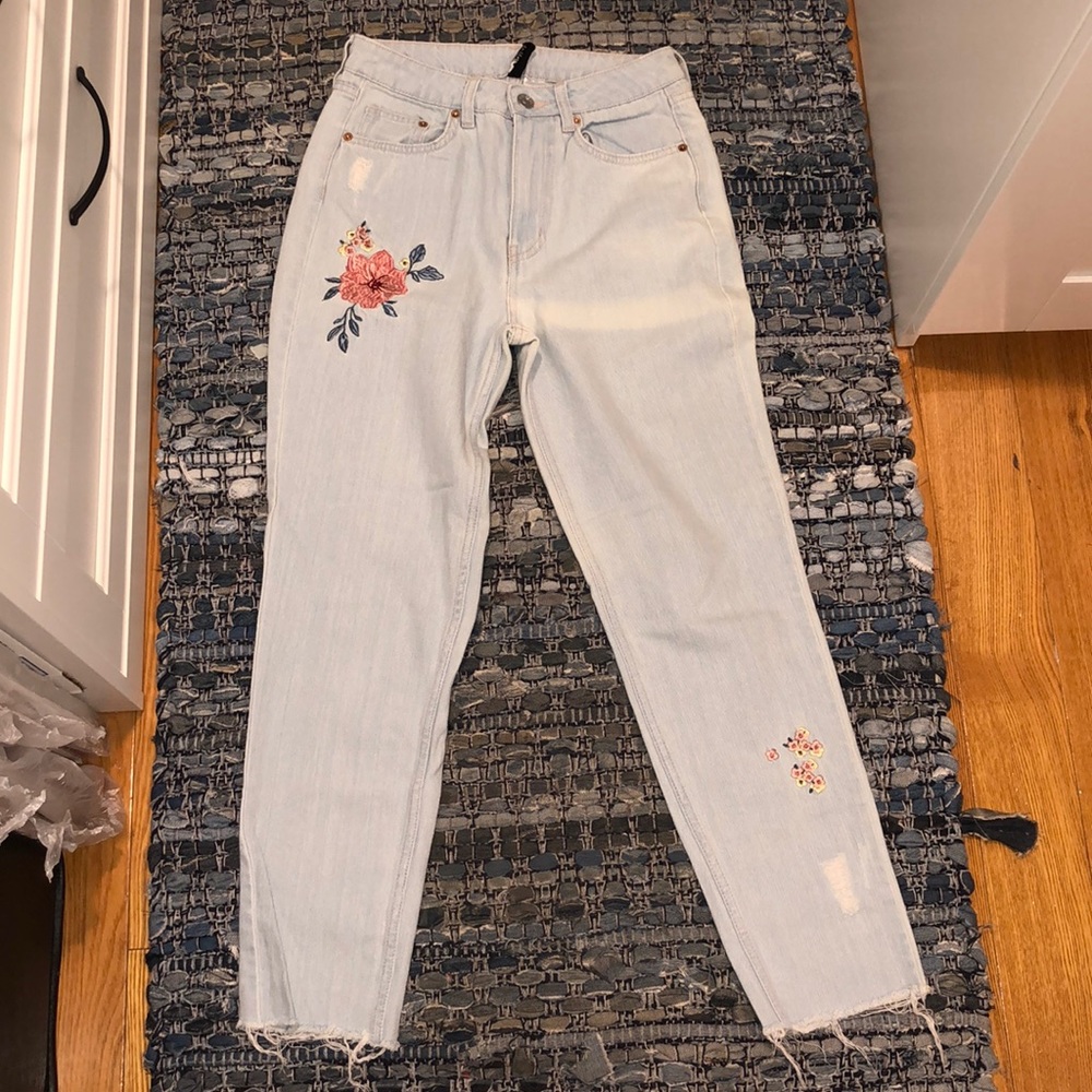 Floral embroidered light washed jeans